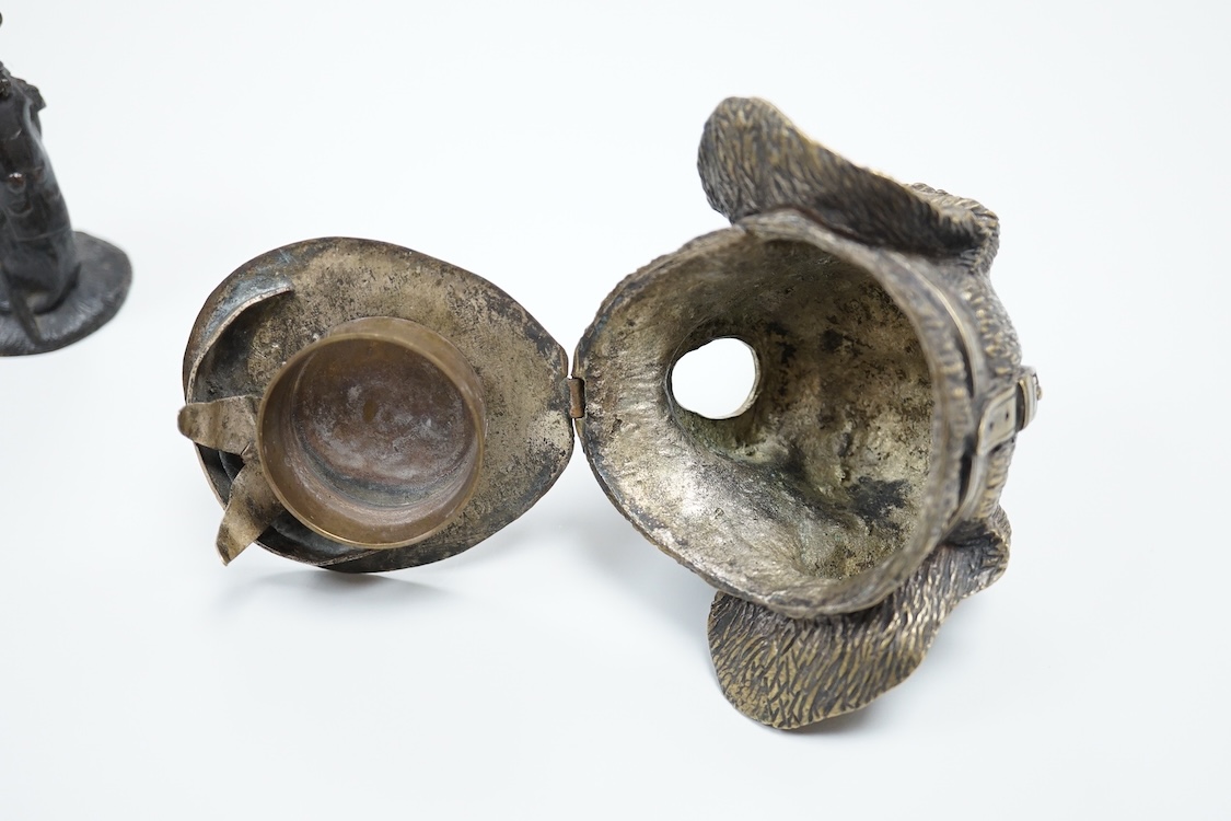 A novelty dog's head Pastille burner and bronze monkey, largest 11cm wide